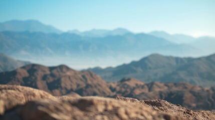 Naklejka premium Capture a bokeh photo of a picturesque desert with beautiful colors, featuring majestic mountains in the distance and a bright sky. The view is of superior quality and looks natural