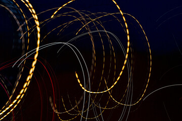 Long camera exposures of artificial light sources at night