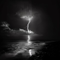 Black and white photo of a lightning storm over the ocean. The waves are crashing against the shore and the lightning is illuminating the dark sky.