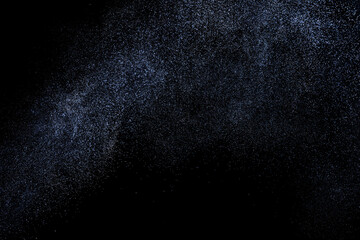 Black and blue grunge texture. Abstract splashes of water on dark background. Light clouds overlay...