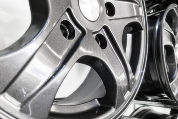 Close-up view of alloy wheels designed for passenger cars.