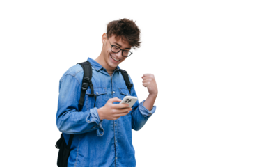 Grateful smart teen boy in jeans shirt received great News  in message smiles clenches fist like winner excited by passed exams against transparent background. Mockup, success, happy people.