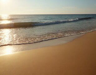 The sun is setting over the ocean, casting a warm glow on the water