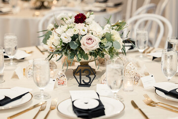 Elegant wedding table setting with floral centerpiece
