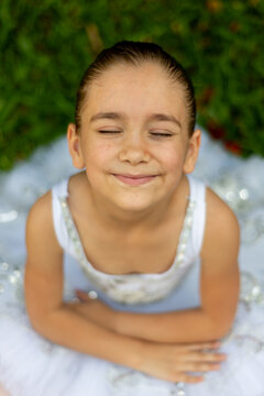A little girl dressed as a ballerina