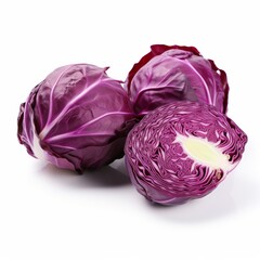 Obraz premium Whole and cut red cabbages on white background