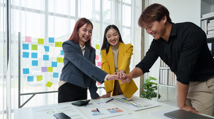 Business teamwork holding hands concept Business team joining hands Participate in business work...