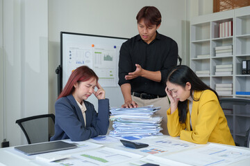 Professional manager or supervisor Asian businessman Reprimand and remind employees of mistakes in...