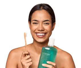 Young Filipino with toothbrush and mouthwash, oral care