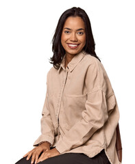 Seated Filipino woman looking at camera