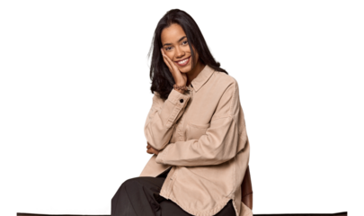 Seated Filipino woman looking at camera