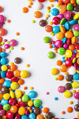 Obraz premium Colorful candies on white background
