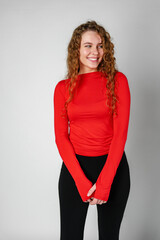 Young Woman With Curly Hair Portrait against gray background