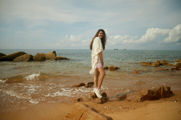 Person standing on the beach in Vietnam