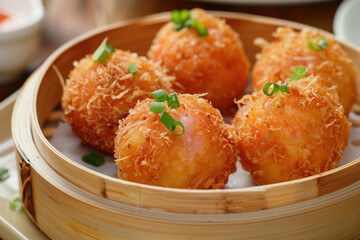 Crispy Fried Shrimp Balls with Green Onion Garnish in a Bamboo Steamer
