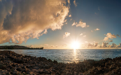 Hawaiian Kawela Bay Beach colorful Sunset Phase with silhouette palm trees