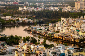 Ho chi minh City, Vietnam - April 21, 2024 aerial view of Ong Lon canal  look from the 25th Floor roof terrace of The Gold View apartment, district 4 during early morning