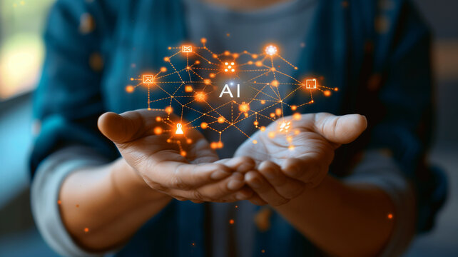 Close up human hand with AI text and hologram data.