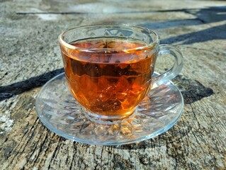 A cup of tea. A cup of warm tea in the morning with a very fragrant aroma that can refresh the body and increase your enthusiasm for activities in the morning