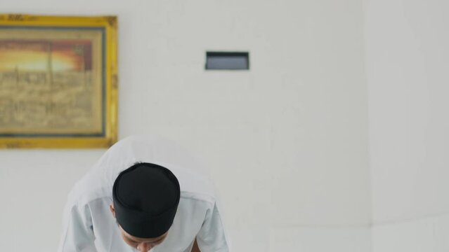 Young Asian Muslim Man Praying Salah At Mosque