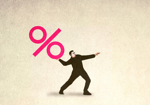 Man throwing percentage symbol against white background