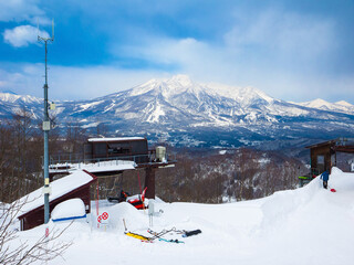 Snowy peaks viewed from a ski resort on a sunny day (Mt. Myoko, vired from Madarao Kogen, Nagano, Japan)