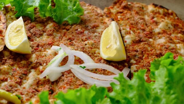 Turkish style minced meat lahmacun close-up
