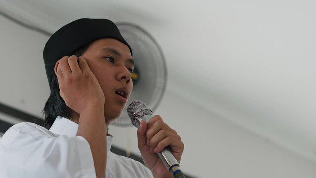 Asian Muslim Man Call To Prayer For Salah At Mosque.