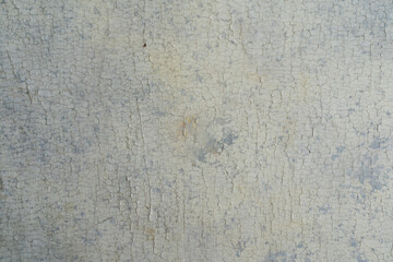 Photo background texture of a very old wooden surface treated with cracked paint. Vintage.