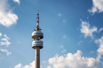Close view of TV tower with beautiful clouds in front of blue sky, Snezhanka TV tower on Snezhanka...