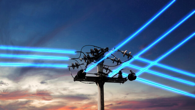 High-voltage power line tower with glowing wires