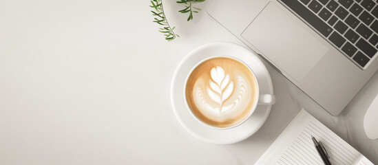 coffee latte with laptop in the table concept background