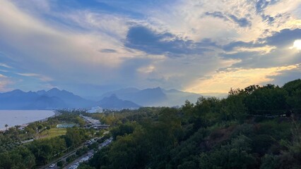 sunset in the mountains, Panoramic view of the sea, mountains and Antalya beach