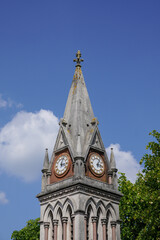 Traditional clock tower in village square. clock dial monument 