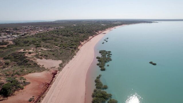Aerial view of serene beach with red sand and mangrove, Simpson Beach, Western Australia, Australia.