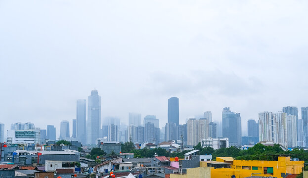 view of the buildings in the city of Jakarta from the Manggarai train station, cloudy cityscape, Jakarta city cityscape