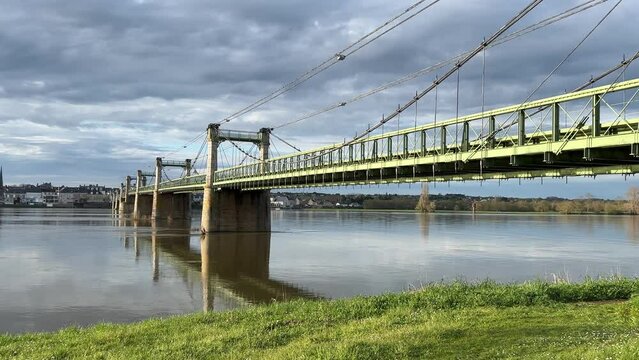 By a bridge crossing the River Loire going to Ingrandes Le Fresne sur Loire.