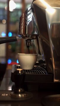 espresso machine pouring espresso