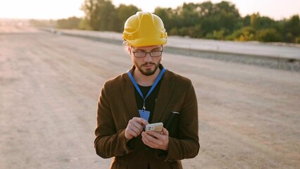 Portrait of architect on construction site outside