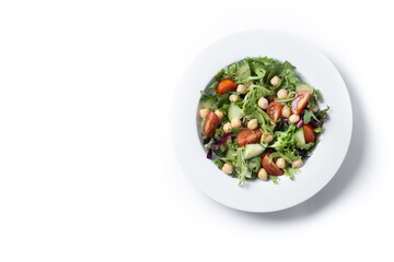 Healthy chickpea salad with tomato,lettuce and cucumber isolated on white background. Top view....