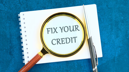 Business, finacial and fix your credit here concept. Fix your credit here symbol through a...