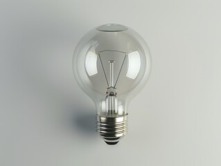 Glowing light bulb on a plain background