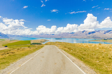 Empty road leading to Lake Tekapo in New Zealand