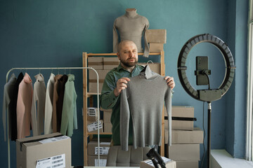 The blogger broadcasts and talks about the availability of clothes in the online store. Small...