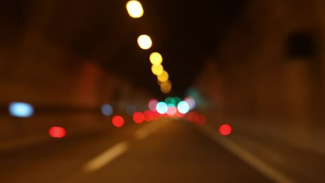 De-focused Colorful Traffic Lights in a Tunnel Background Dreamy B Roll