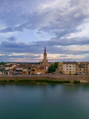 Obraz premium Aerial view of the city of Macon, France, with its historic architecture and winding roads