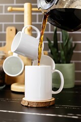 Person pouring hot, freshly brewed coffee from a pot into a mug sitting on a kitchen countertop.
