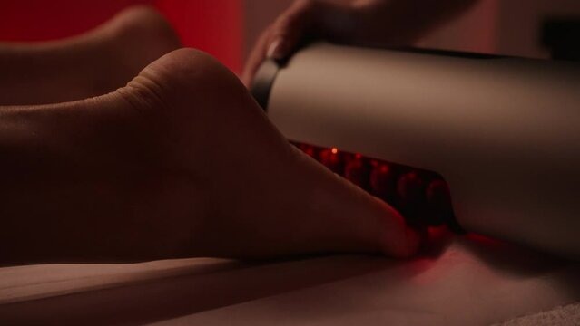 Closeup View Of Foot Massage With RSL-Sculpting Roller In SPA Salon, Relax In Massaging Room