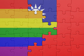 puzzle with the colourful national flag of taiwan and rainbow gay pride flag .