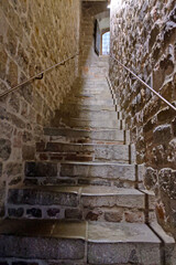 Vertical View of Medieval Stone Staircase in Historic Castle